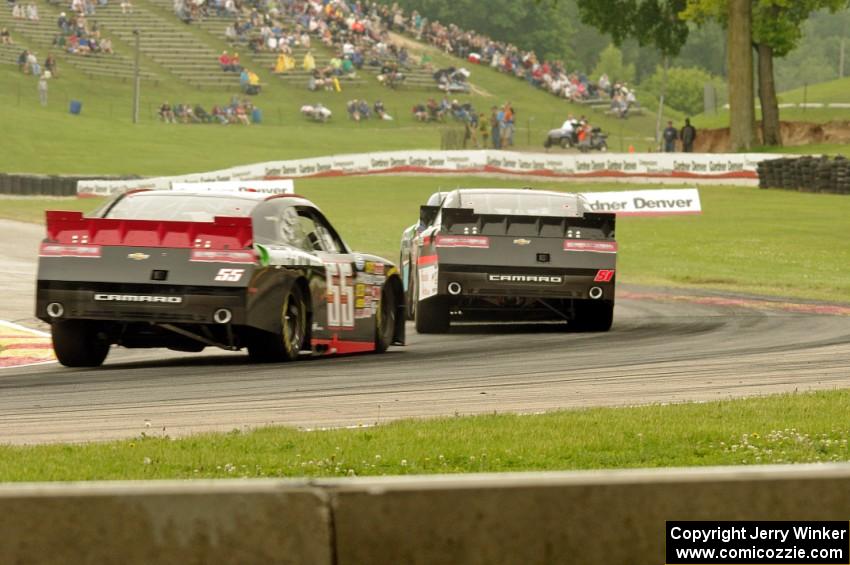 Elliot Sadler's Toyota Camry, Jeremy Clements' Chevy Camaro and Andy Lally's Chevy Camaro