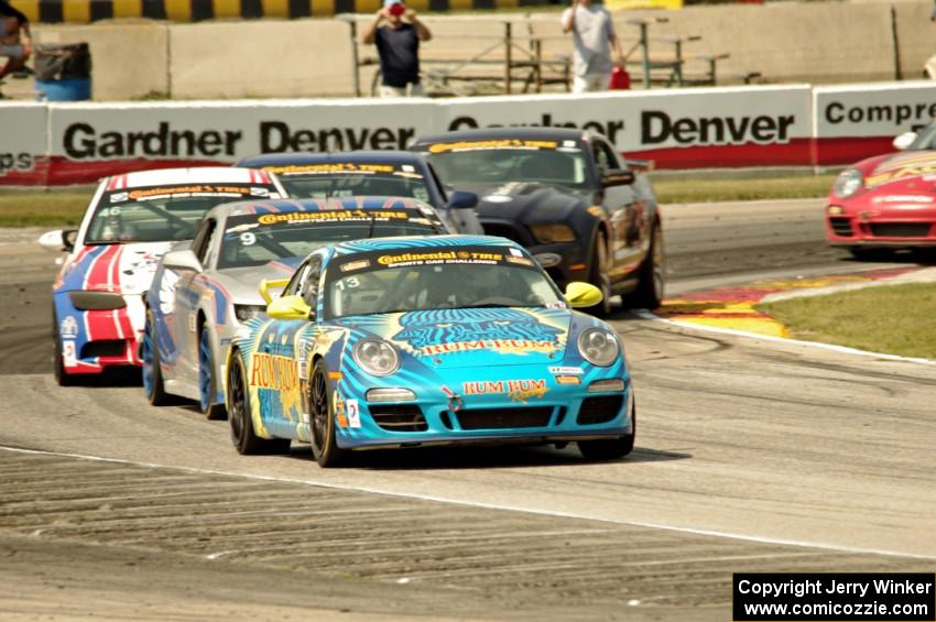 Matt Plumb / Nick Longhi Porsche 997 leads the field through turn 8.