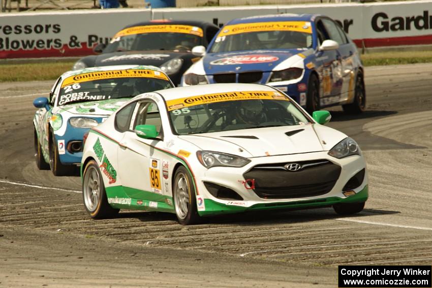 Charles Espenlaub / Cameron Lawrence Hyundai Genesis Coupe leads a pack of ST cars.