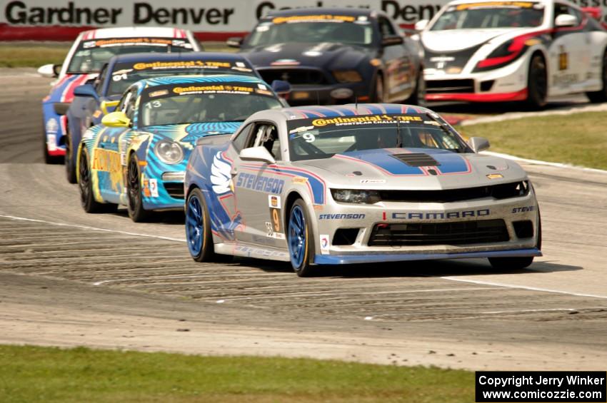 Andy Lally / Matt Bell Chevy Camaro Z/28.R leads into turn 8.