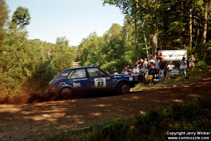 Mark Utecht / Brenda Corneliusen Dodge Omni GLH Turbo at the spectator corner on SS10, Kabekona.