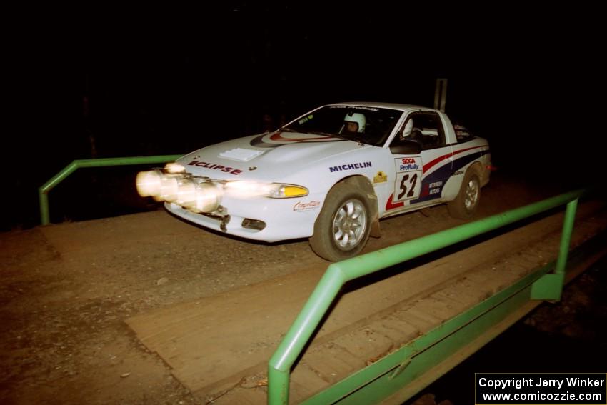 Doug Shepherd / Pete Gladysz Mitsubishi Eclipse at speed across the final bridge on SS10, Menge Creek.