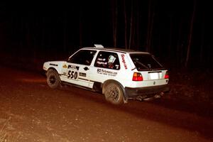 Aaron Hatz / Brendan Higgins VW GTI at speed near the end of SS10, Menge Creek.