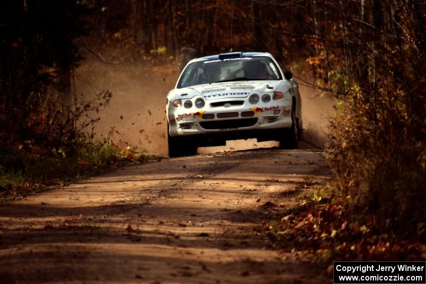 Paul Choiniere / Jeff Becker Hyundai Tiburon at speed near the finish of SS11, Gratiot Lake I.