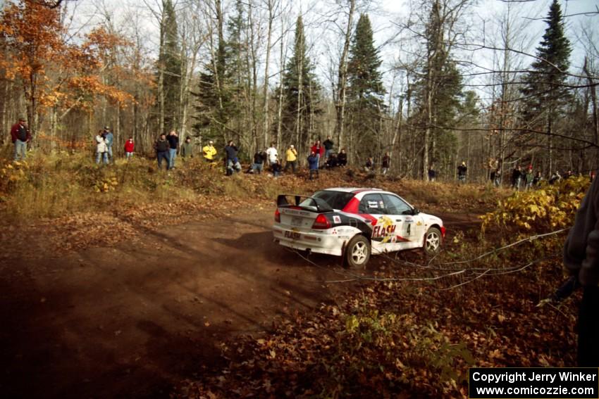 Garen Shrader / Michael Fennell Mitsubishi Lancer Evo IV at the final corner of SS11, Gratiot Lake I.