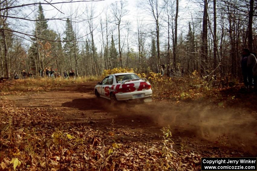 Henry Krolikowski / Cindy Krolikowski Subaru WRX STi at the final corner of SS11, Gratiot Lake I.