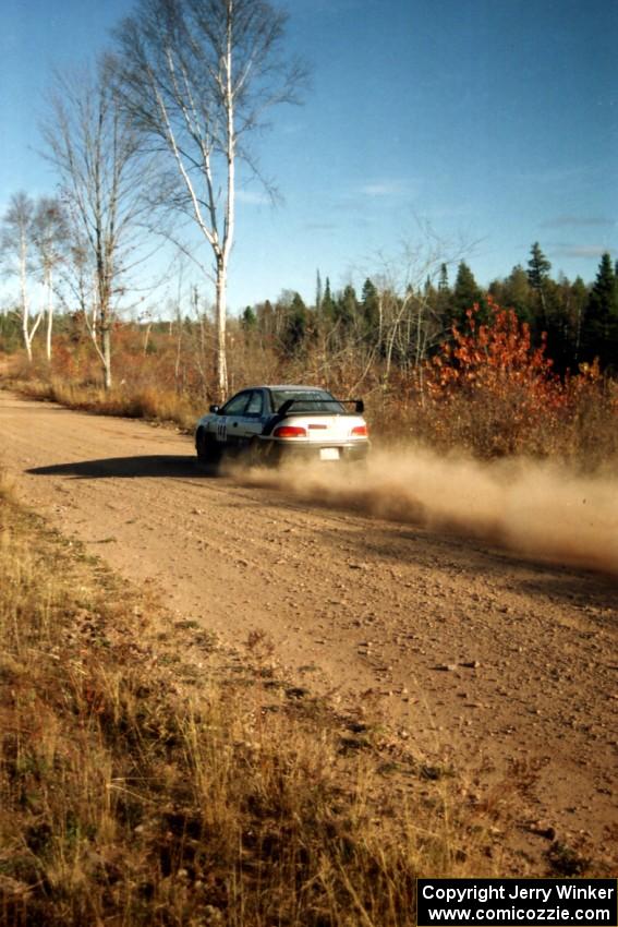 Lon Peterson / Bill Gutzmann Subaru Impreza 2.5RS at speed near the end of SS17, Gratiot Lake II.