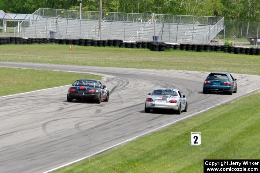 Mark Utecht's ITJ Honda Civic with Chris Craft's and Samantha Silver's Spec Miata Mazda Miatas