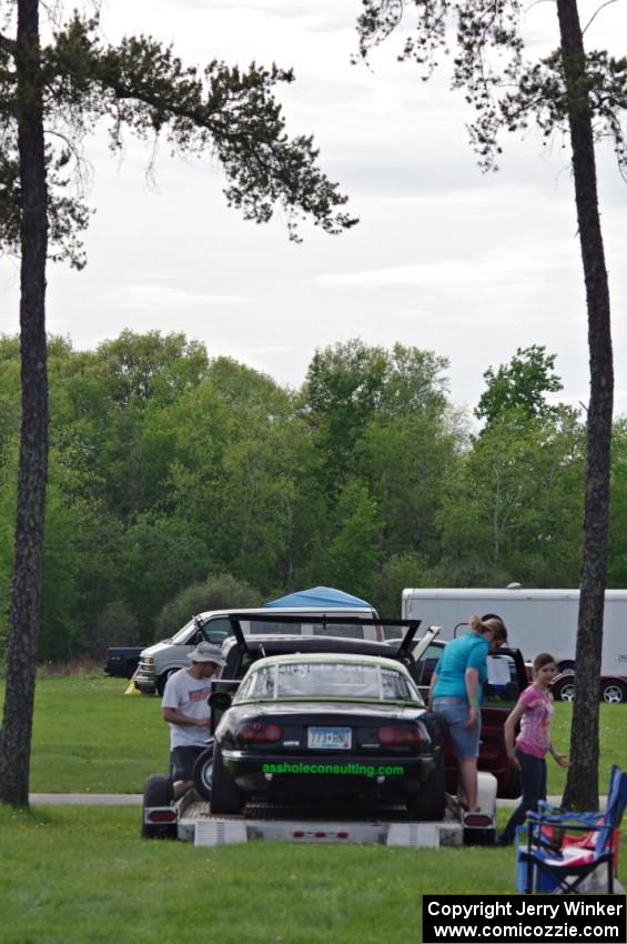 Aaron Jongbloedt's Spec Miata Mazda Miata in the paddock.