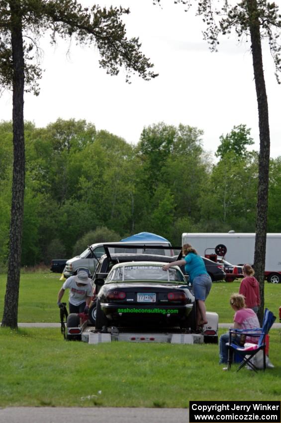 Aaron Jongbloedt's Spec Miata Mazda Miata in the paddock.