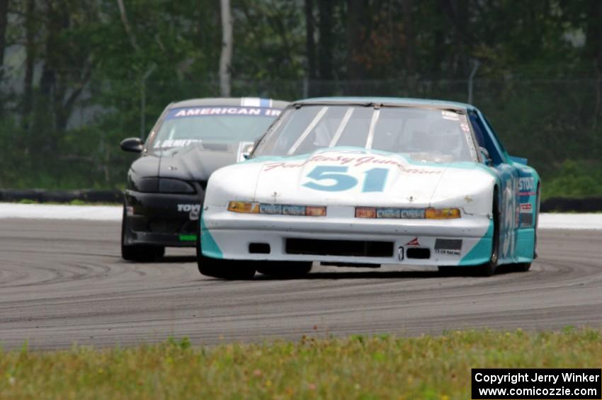 Guy Dirkin's SU Olds Cutlass Supreme and Jeff Demetri's American Iron Ford Mustang