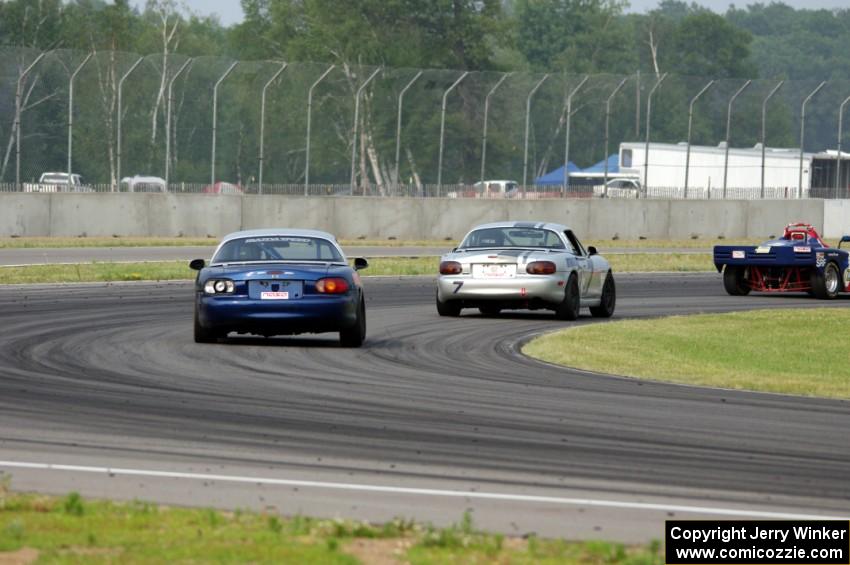 Chris Craft's PTE Mazda Miata and Tom Roberts' PTE Mazda Miata