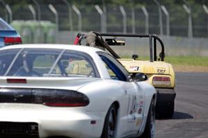 TBD Pontiac Firebird chases Rat Patrol Triumph TR-7