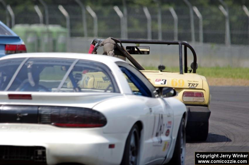 TBD Pontiac Firebird chases Rat Patrol Triumph TR-7