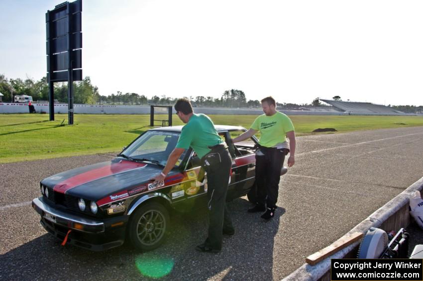 Locked Out Racing BMW 325is in the pits.