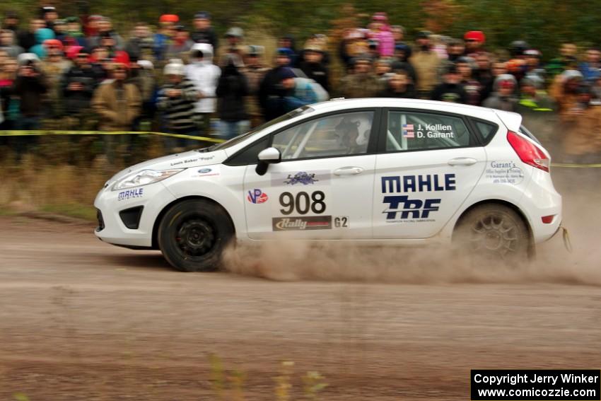 Justin Kollien / Daniel Garant Ford Fiesta R1 comes through the SS1 (Green Acres I) spectator area.