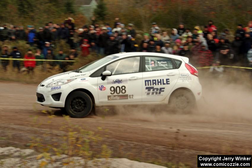 Justin Kollien / Daniel Garant Ford Fiesta R1 comes through the SS1 (Green Acres I) spectator area.