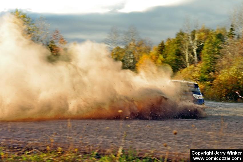 Lauchlin O'Sullivan / Scott Putnam Subaru WRX STi comes through the SS15 (Green Acres II) spectator area.