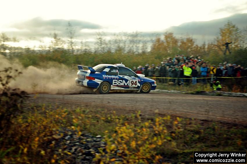 Piotr Fetela / John Hall Subaru Impreza STi comes through the SS15 (Green Acres II) spectator area.