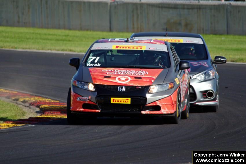 Ron Yarab's Honda Civic Si and Samantha Tan's Kia Forte Koup