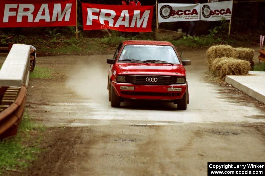 Jon Kemp / Gail McGuire Audi 4000 Quattro comes through the spectator area at Phasa, SS4.