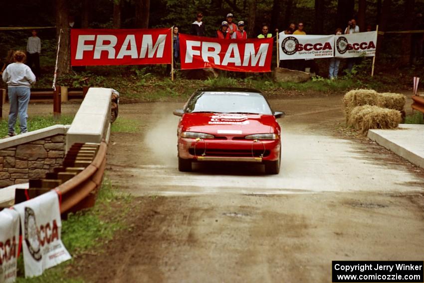 Mark Utecht / Brenda Lewis Mitsubishi Eclipse GSX comes through the spectator area at Phasa, SS4.