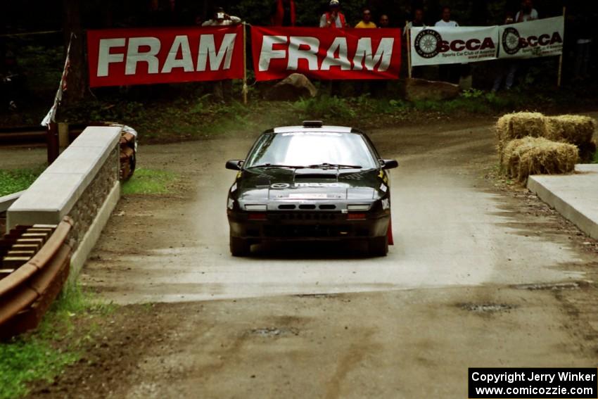 Dave Hintz / Rick Hintz Mazda RX-7 comes through the spectator area at Phasa, SS4.