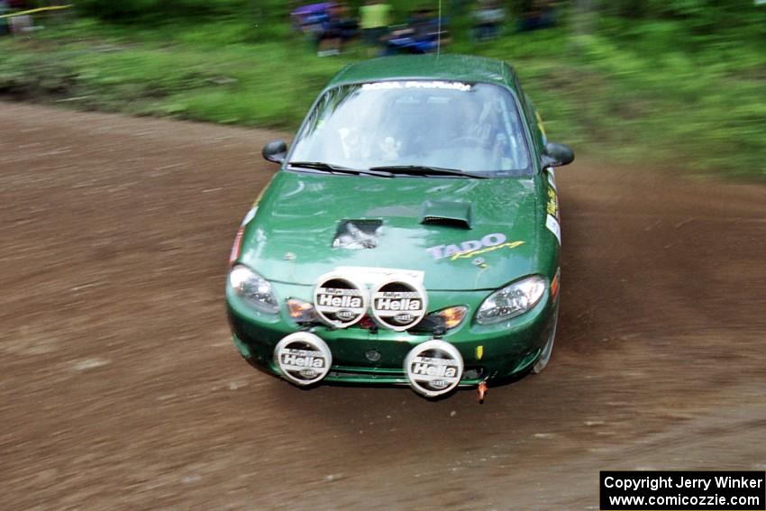 Tad Ohtake / Martin Dapot Ford Escort ZX2 at the first hairpin on Colton Stock, SS5.