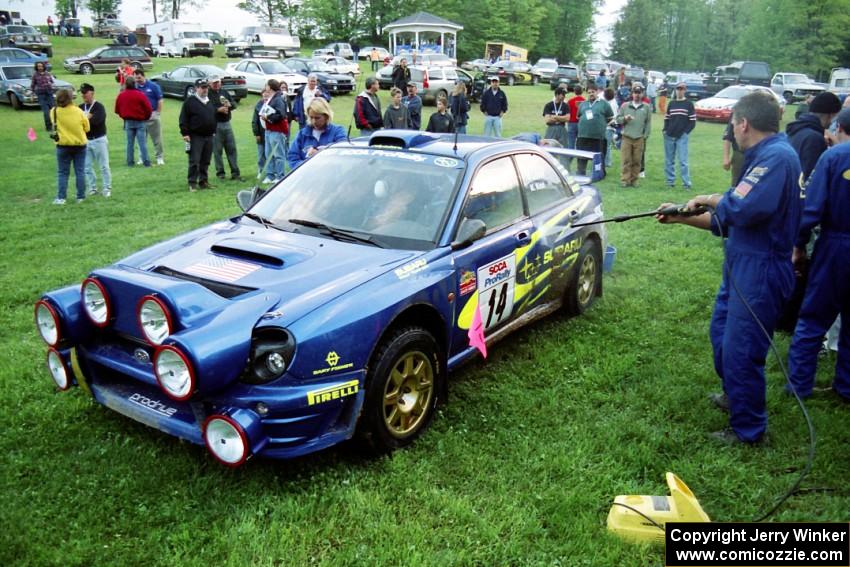 Mark Lovell / Mike Kidd Subaru WRX STi gets hosed down at Germania service.