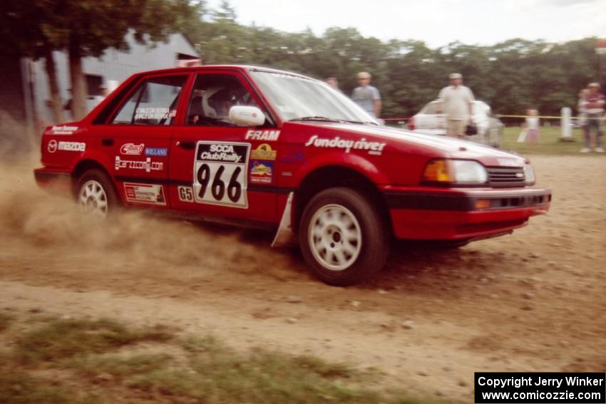 Adam Vale da Serra / Christine Vale da Serra Mazda 323 GT at the finish of SS1, Mexico Rec.