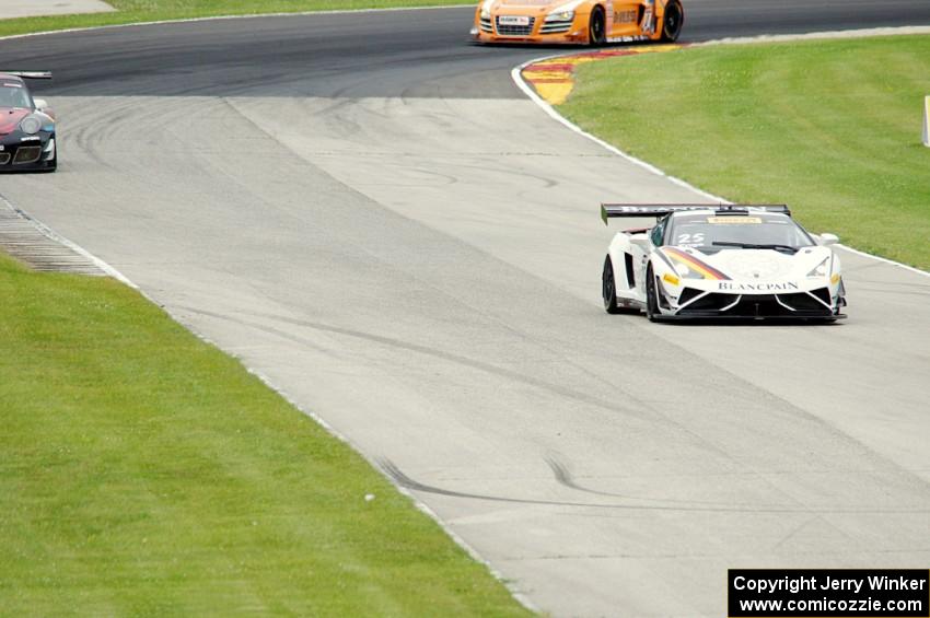 Tomas Enge's Lamborghini Gallardo GT3 FL2, Ryan Dalziel's Porsche 911 GT3R and Mike Skeen's Audi R8 LMS Ultra