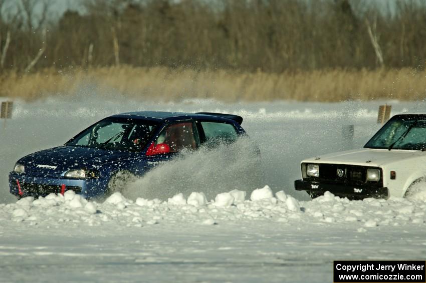 Steve Beeler's Honda Civic and Brad Johnson's VW Rabbit