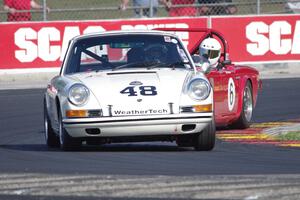 David MacNeil's Porsche 911T and Allen Washatko's Triumph TR-6