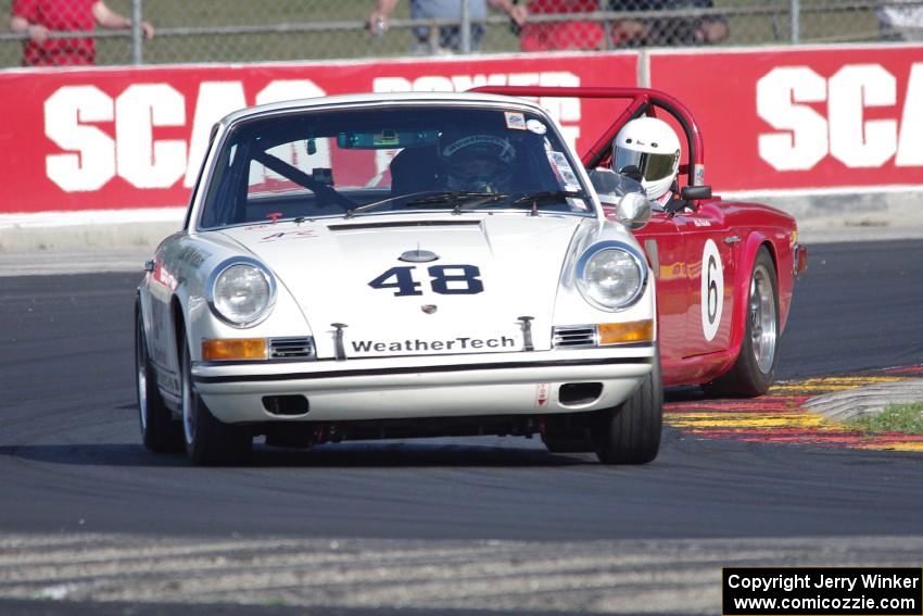 David MacNeil's Porsche 911T and Allen Washatko's Triumph TR-6