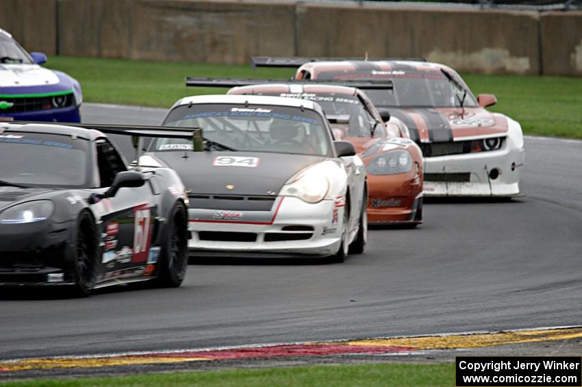 Jason Berkeley's Chevy Corvette, Clint Sawinski's Porsche GT3 Cup, Allan Lewis' Chevy Corvette and Michael McGahern's Chevy Cama