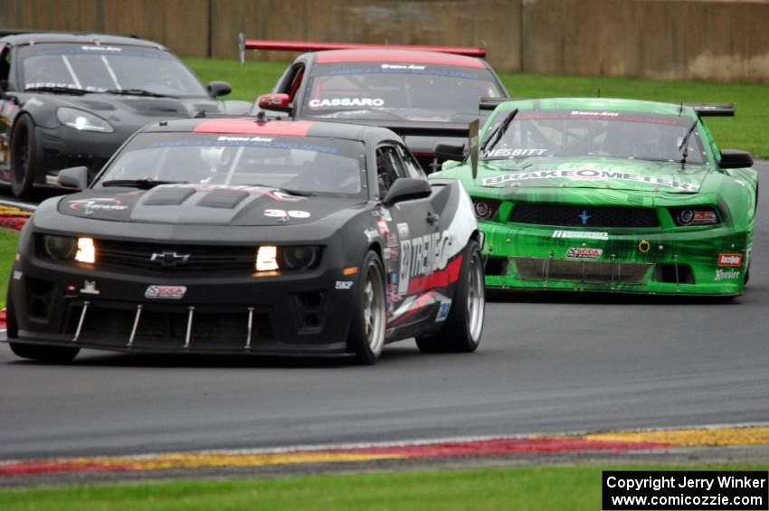 Todd Napieralski's Chevy Camaro, Bruce Nesbitt's Ford Mustang, Chuck Cassaro's Ford Mustang and