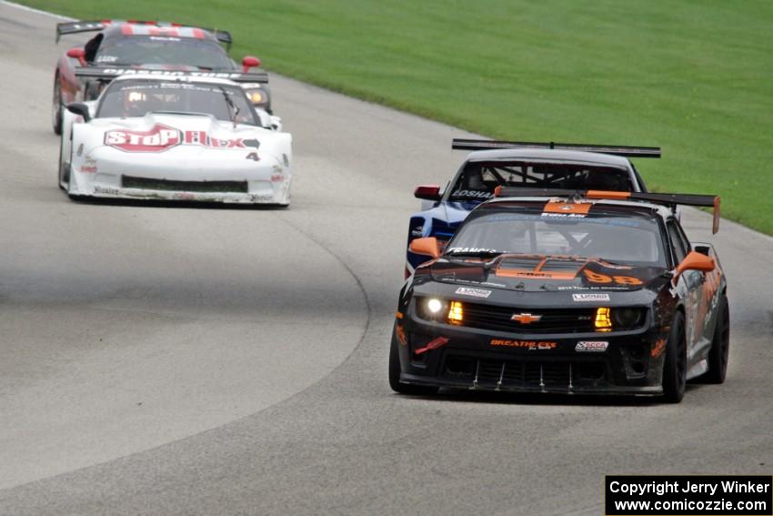 Ernie Francis, Jr.'s Chevy Camaro, Lawrence Loshak's Ford Mustang, Paul Fix's Chevy Corvette and Cindi Lux's Dodge Viper