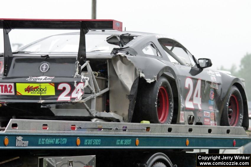 Dillon Machavern's Ford Mustang comes in on the flatbed.