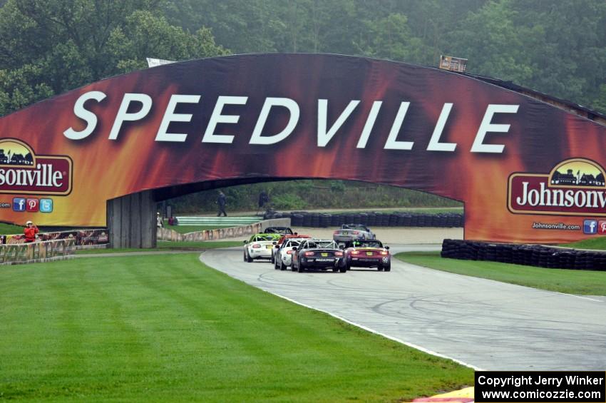 MX-5s head out of turn 8 into the carousel.