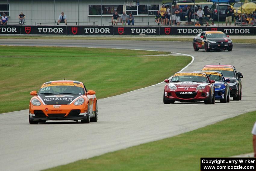 Jeff Mosing / Eric Foss Porsche Cayman leads ST early on.