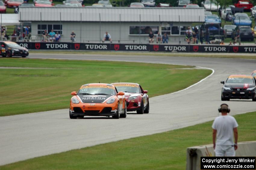 Jeff Mosing / Eric Foss Porsche Cayman, Christian Szymczak / Justin Piscitell Mazda MX-5 and Chad Gilsinger / Ryan Eversley