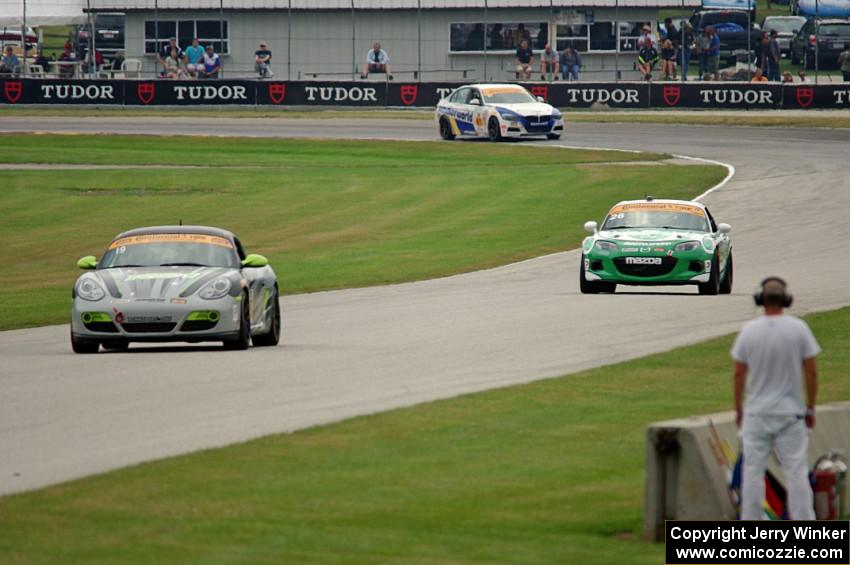 Connor Bloum / Greg Strelzoff Porsche Cayman, Andrew Carbonell / Liam Dwyer Mazda MX-5 and Andrie Hartanto /Tyler Cooke BMW 328i