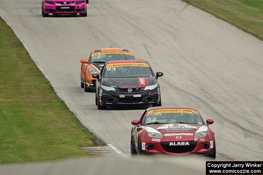 Christian Szymczak / Justin Piscitell Mazda MX-5, Chad Gilsinger / Ryan Eversley Honda Civic Si and Jeff Mosing / Eric Foss