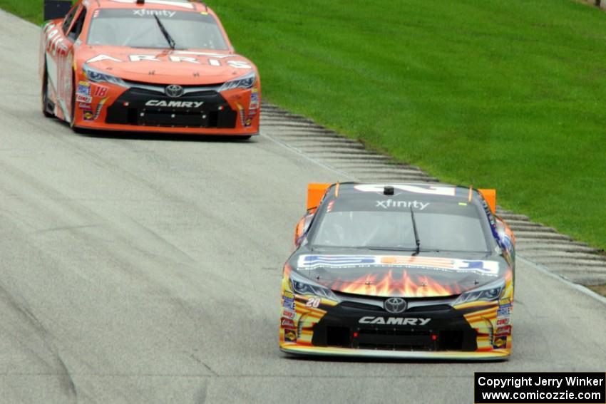 Kenny Habul's Toyota Camry and Daniel Suárez's Toyota Camry