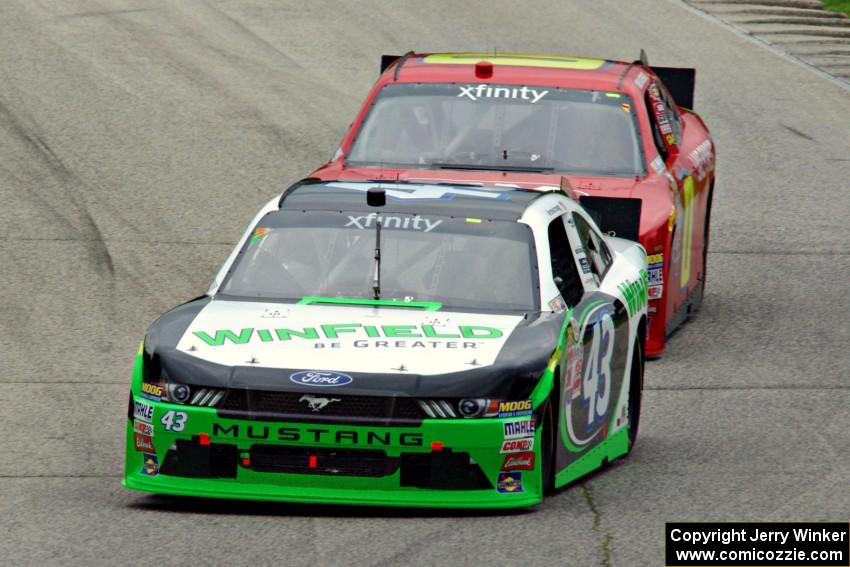 Dakoda Armstrong's Ford Mustang and Lawson Aschenbach's Chevy Camaro