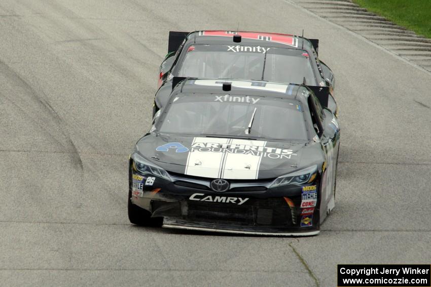 Tomy Drissi's Toyota Camry and Jeremy Clements' Chevy Camaro