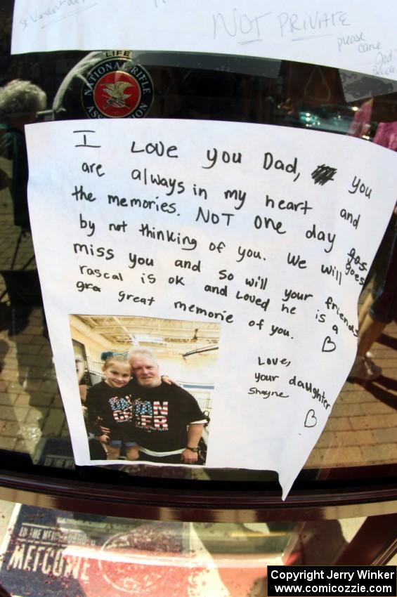 A sign on the Osseo barber shop. The father had died recently.