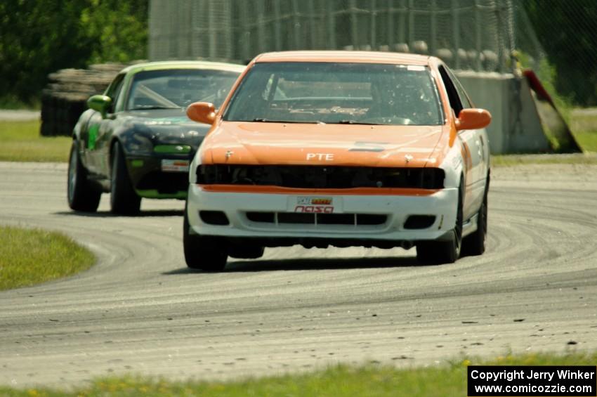 Patrick Price's PTE Nissan 200SX and Aaron Jongbloedt's PTE Mazda Miata