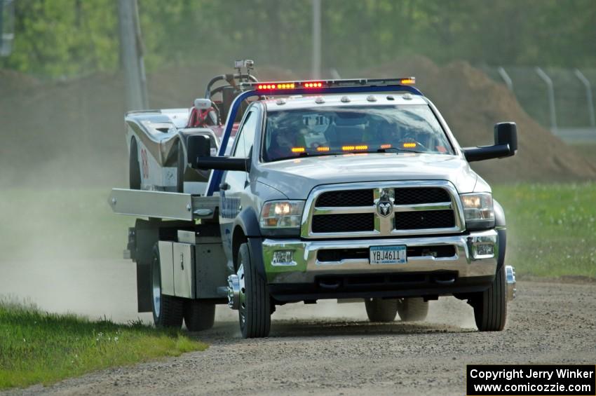 Craig Wheatley's Spec Racer Ford comes in on the flatbed.