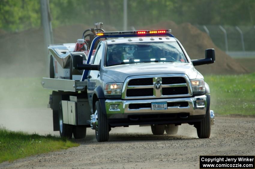 Craig Wheatley's Spec Racer Ford comes in on the flatbed.